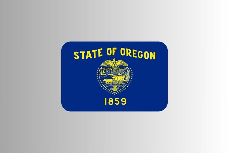 Oregon state flag with a navy blue field and gold lettering reading “State of Oregon” above the state seal and the year 1859; the reverse side features a gold beaver.