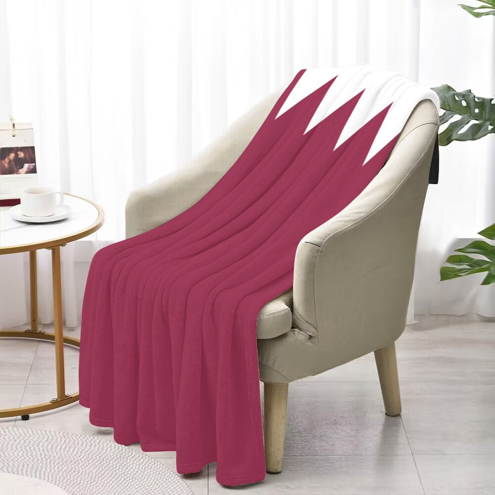 Luv My Flag maroon and white blanket draped over chair.