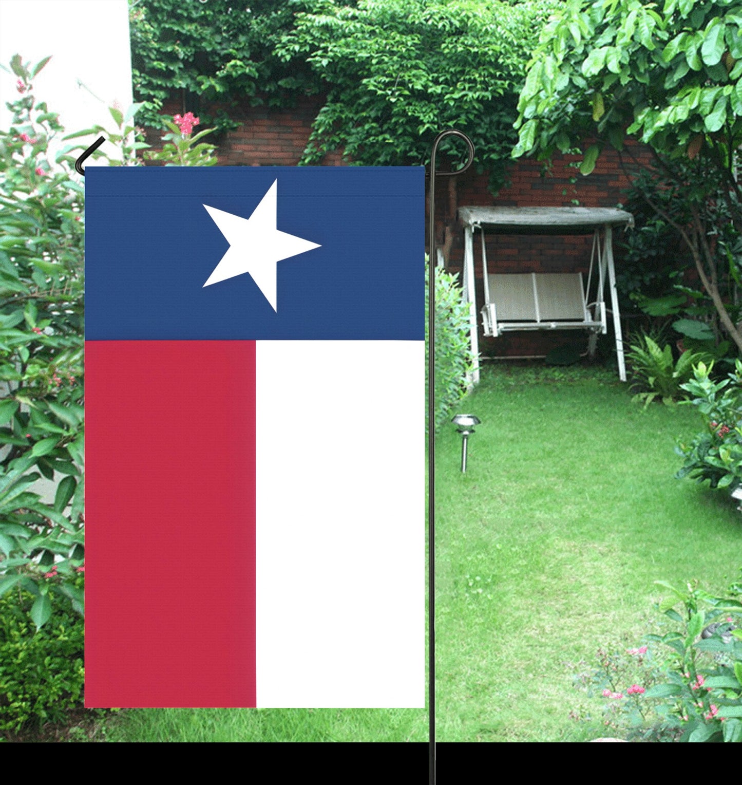 Luv My Flag garden flag with Texas design, lush garden.
