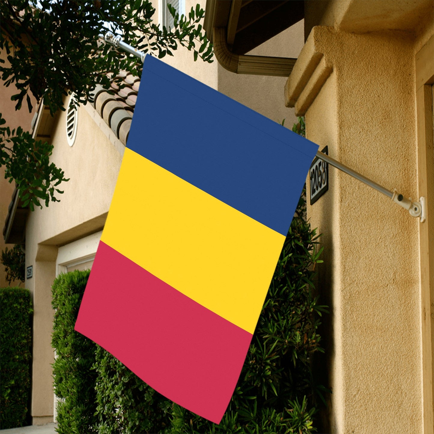 Colorful tricolor flag from Luv My Flag on house.