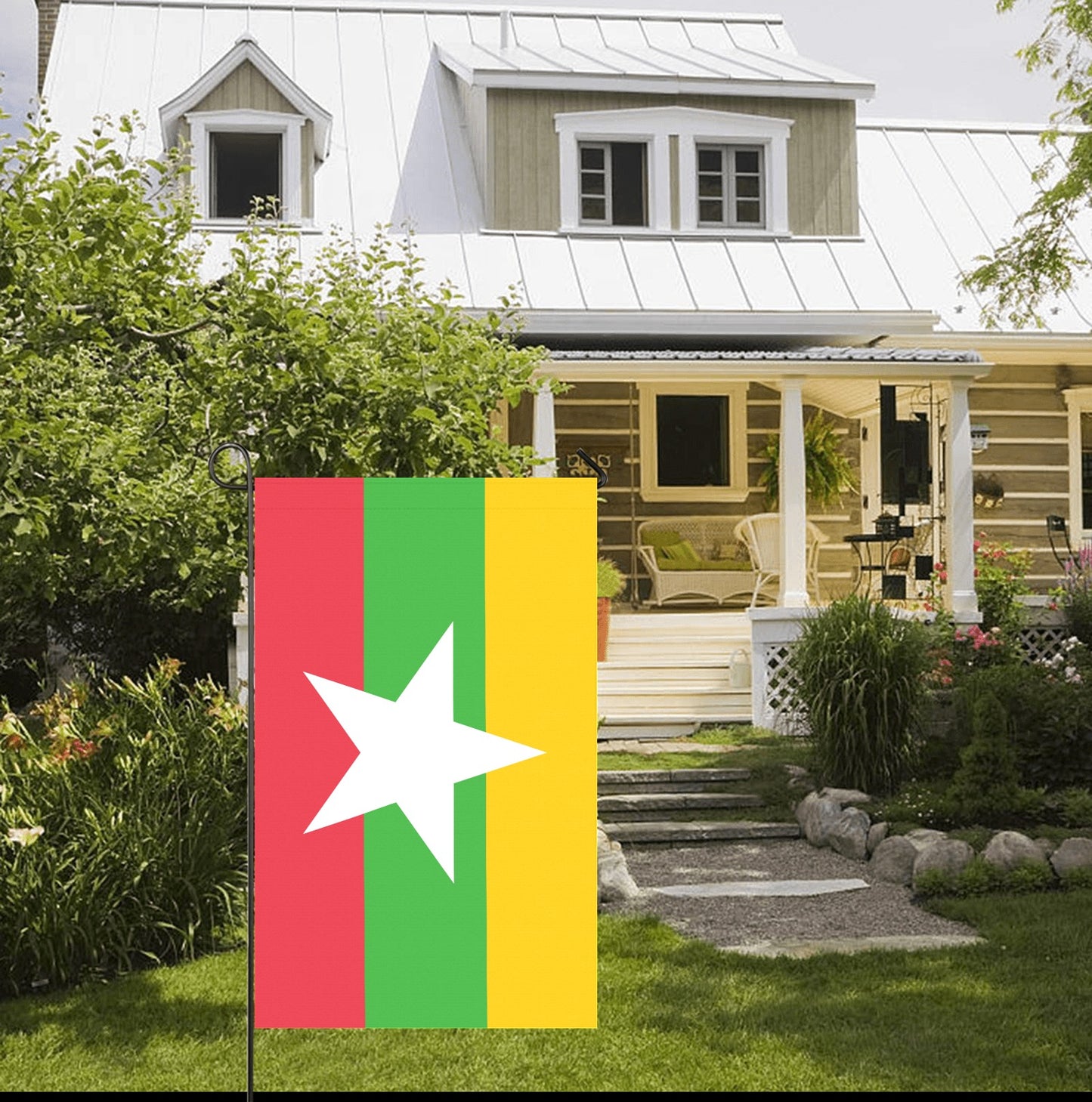 "Luv My Flag banner near cozy house with garden landscaping."