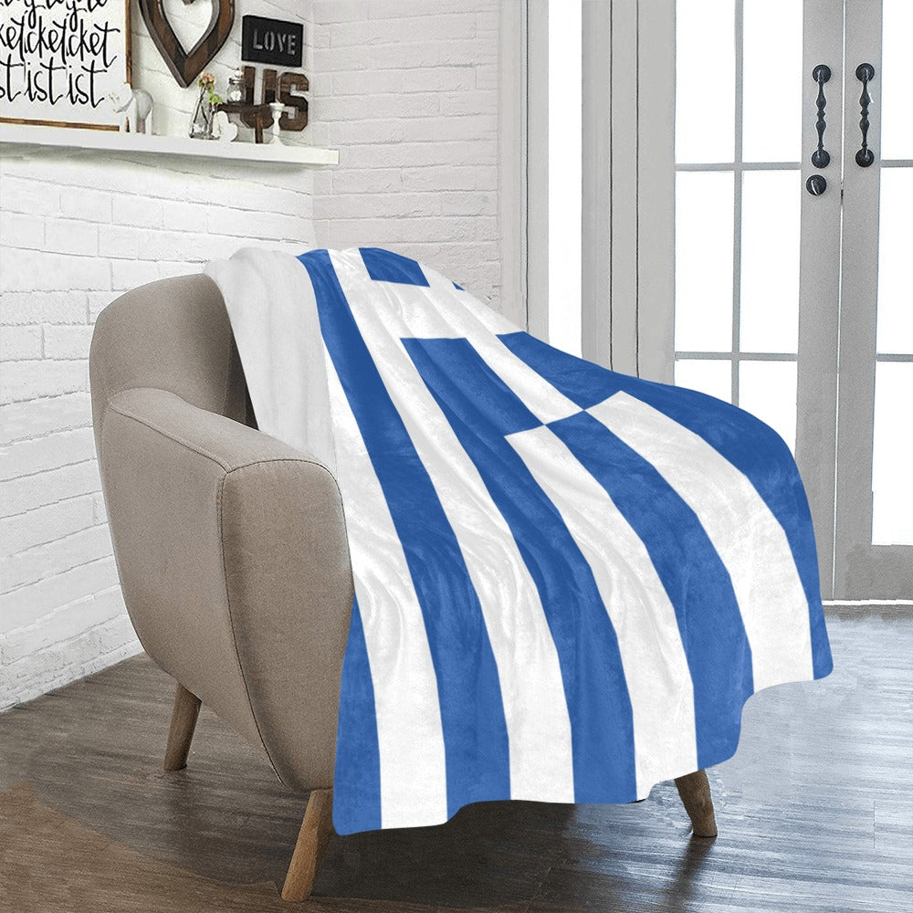 Luv My Flag blanket with Greek flag on armchair.