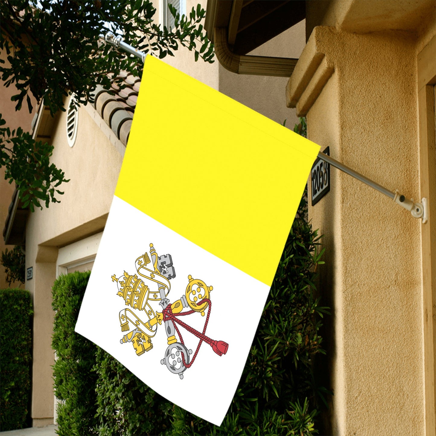 Flag with yellow, white design outside house, Luv My Flag.