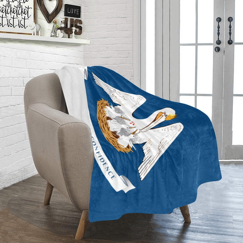 Cozy chair with Luv My Flag blanket featuring pelican.