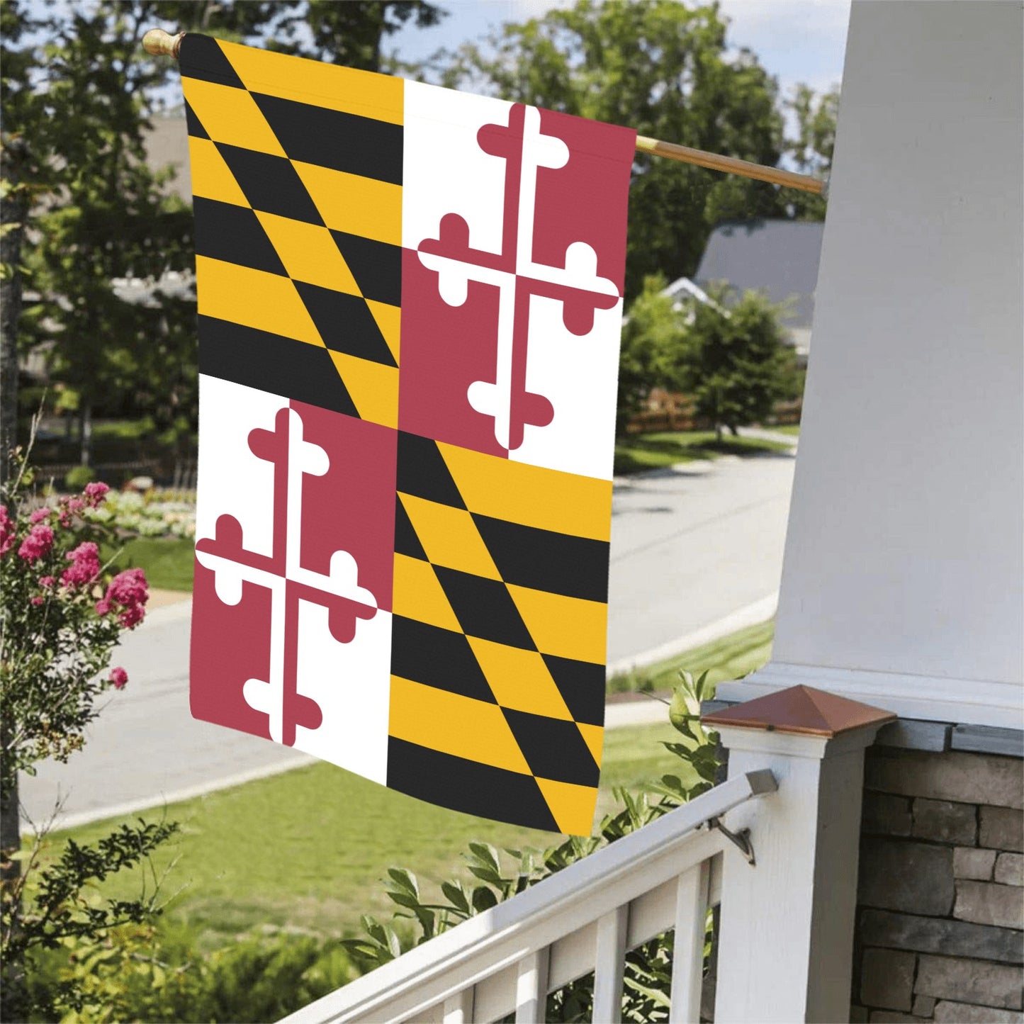 Luv My Flag Maryland flag displayed on porch railing.