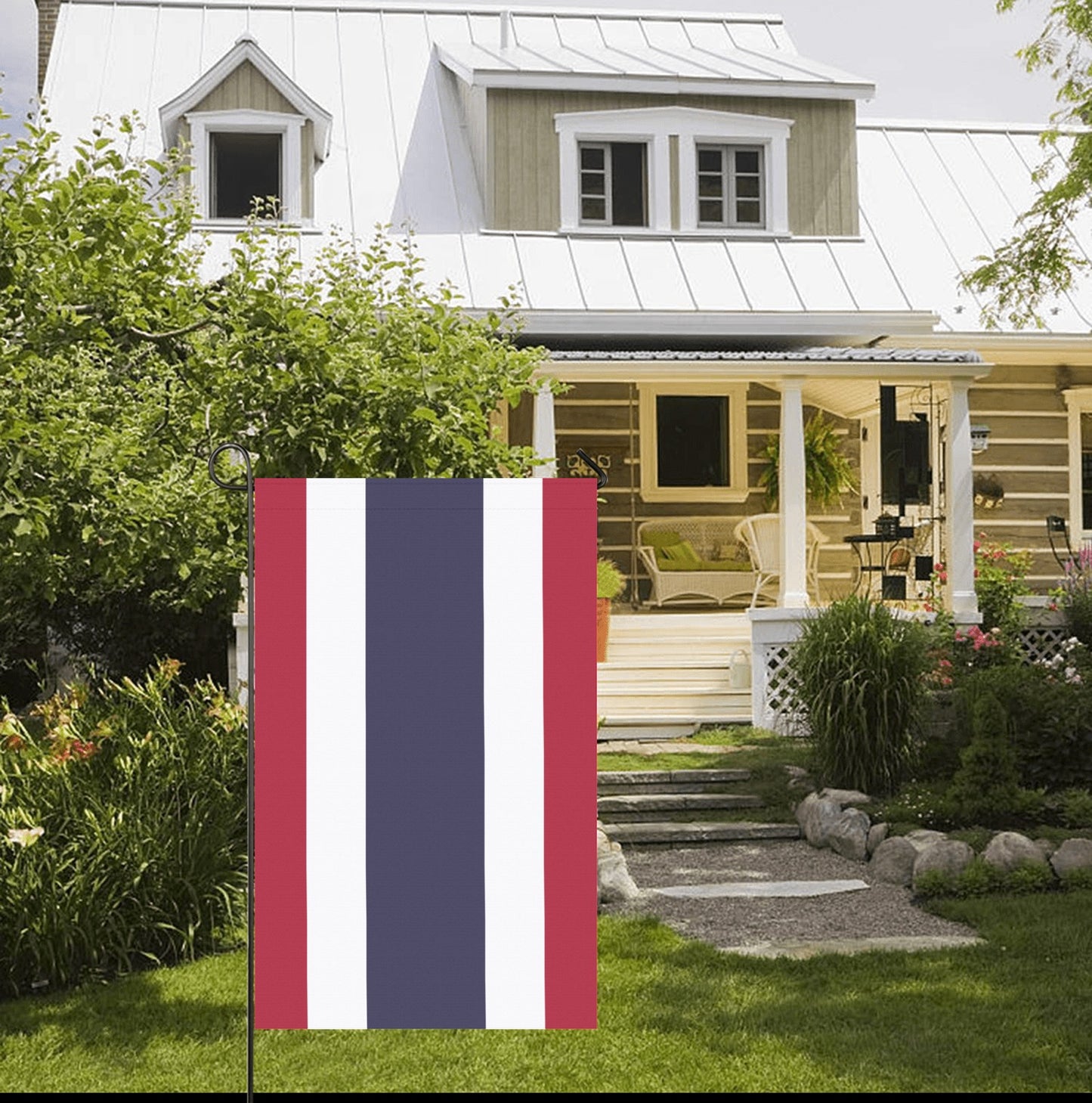 Flag from Luv My Flag displayed in front garden.