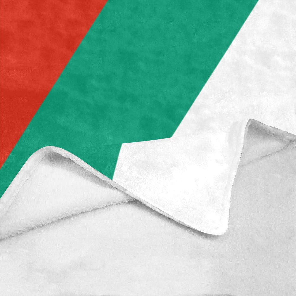 Luv My Flag cozy blanket with red, green, white design.
