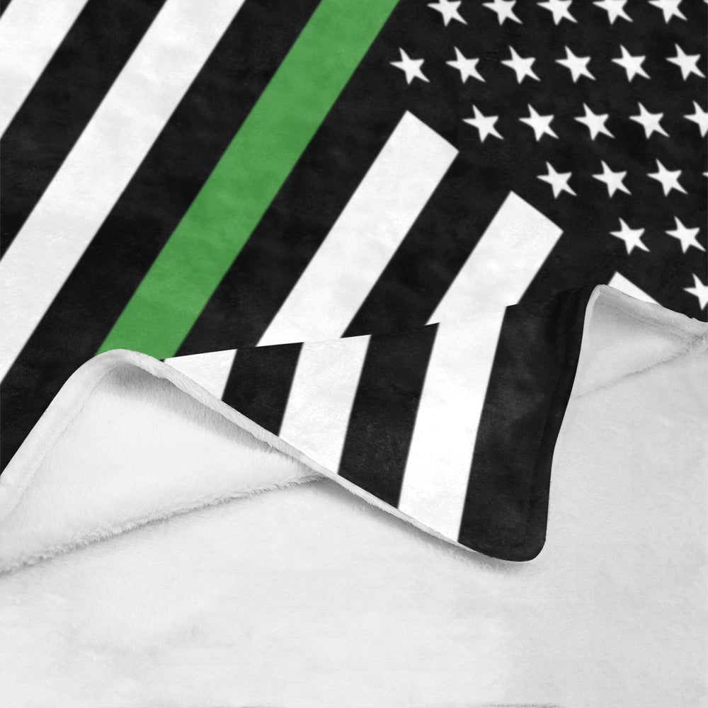 Luv My Flag blanket with green stripe, stars pattern.