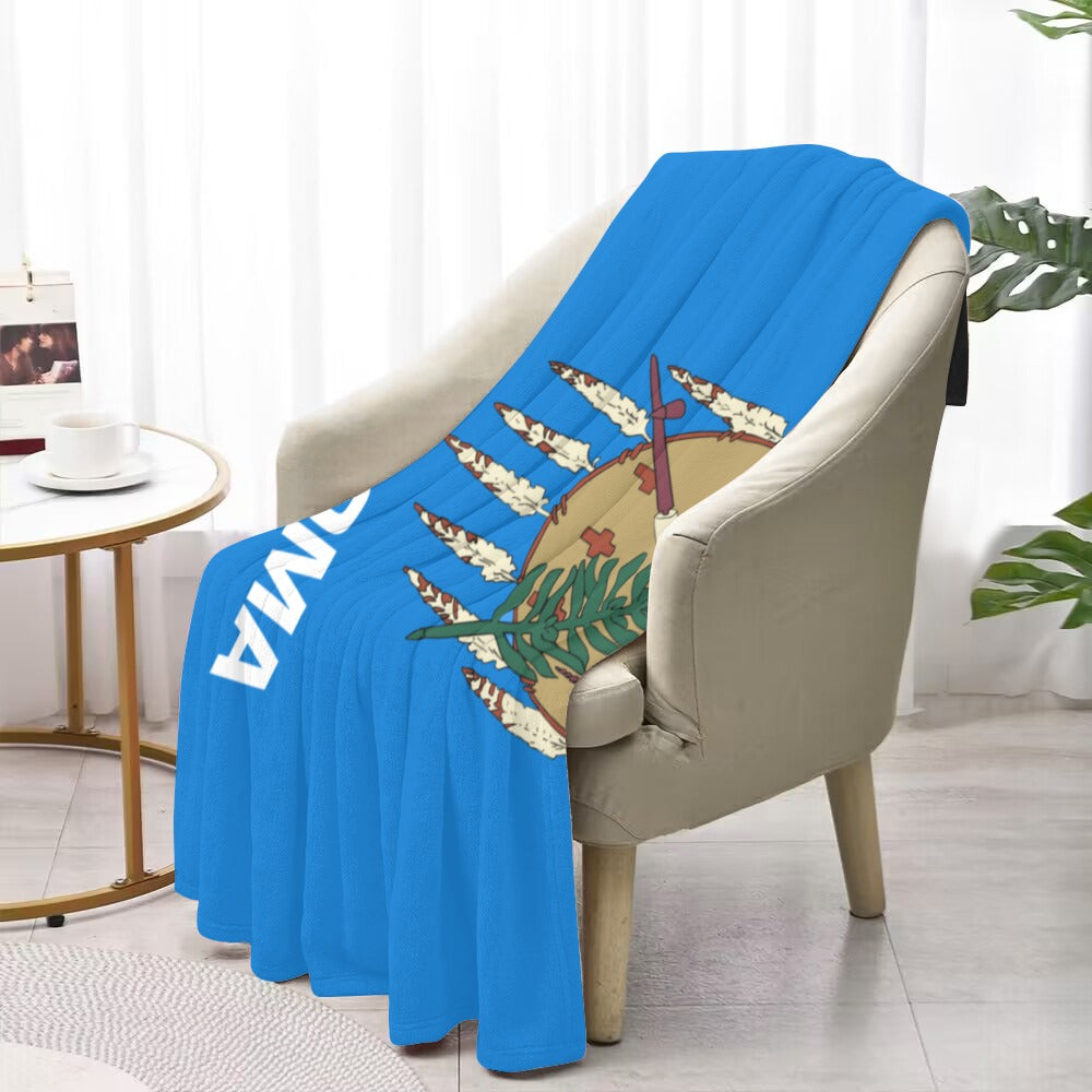 Blue "Luv My Flag" blanket draped over a chair.