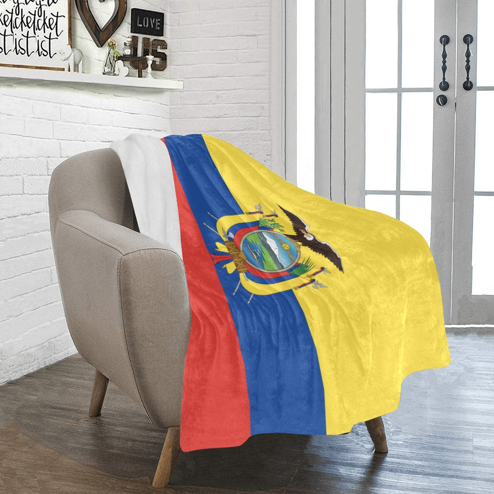 Cozy chair with Luv My Flag Ecuador blanket draped.