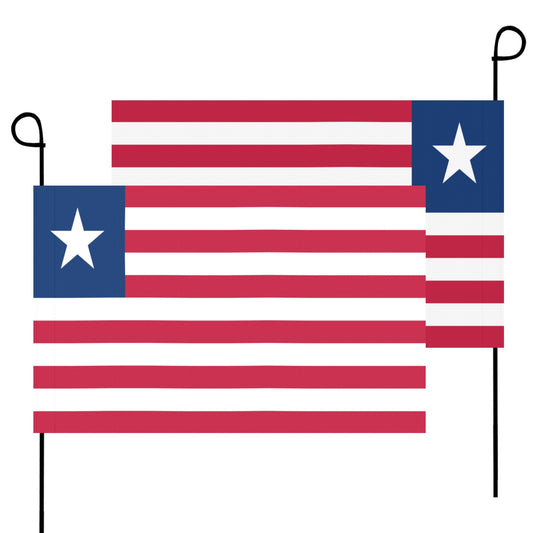 Two Luv My Flag Liberia flags on poles upright.