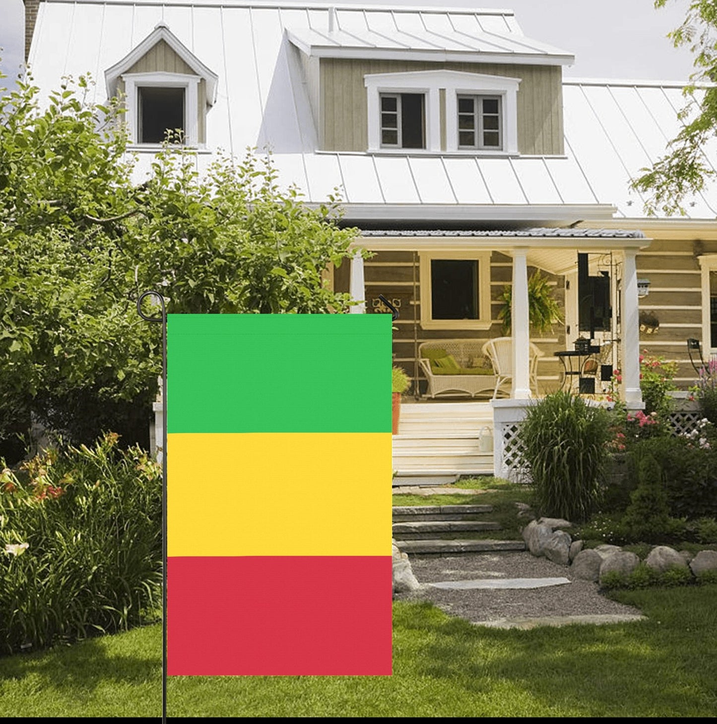 House with garden, green-yellow-red Luv My Flag displayed prominently.