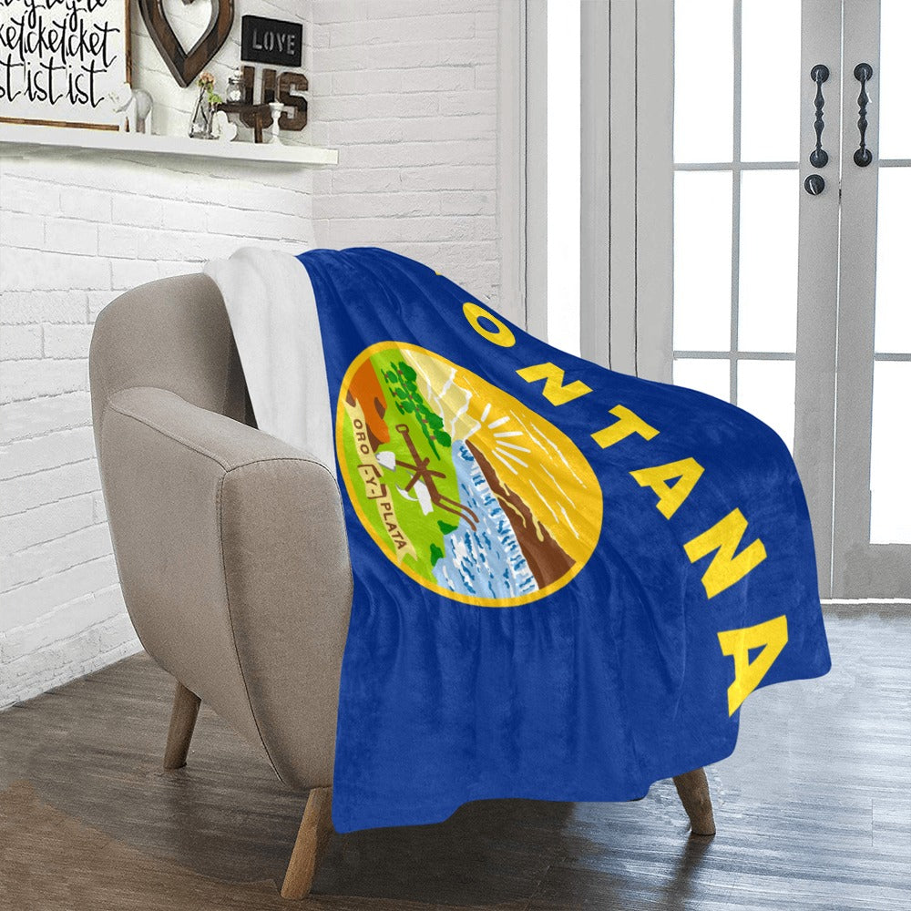 Blue Montana flag blanket on chair from Luv My Flag.
