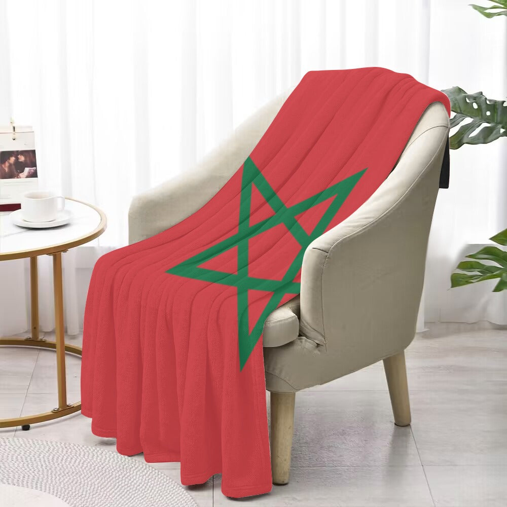 "Luv My Flag blanket featuring Moroccan flag on chair."
