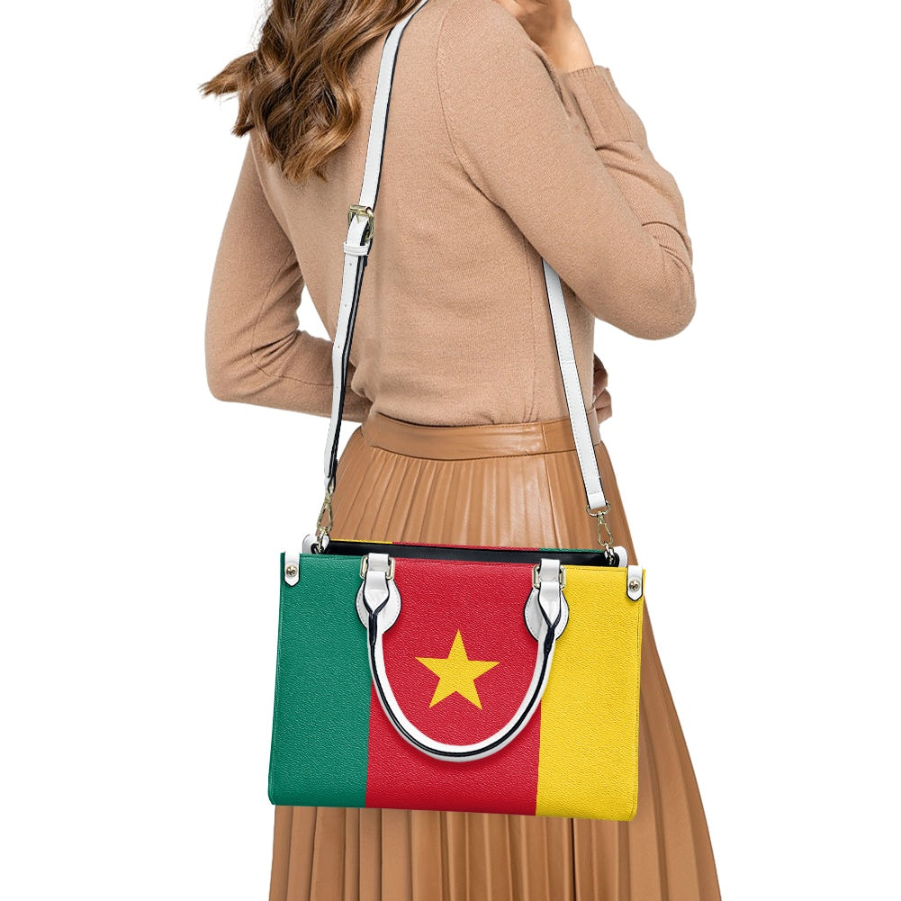 Woman carrying Luv My Flag bag with national colors.