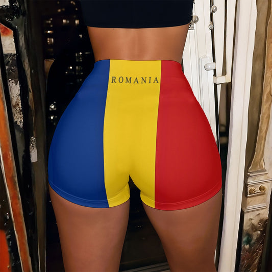 Person wearing Luv My Flag Romania shorts, night setting.