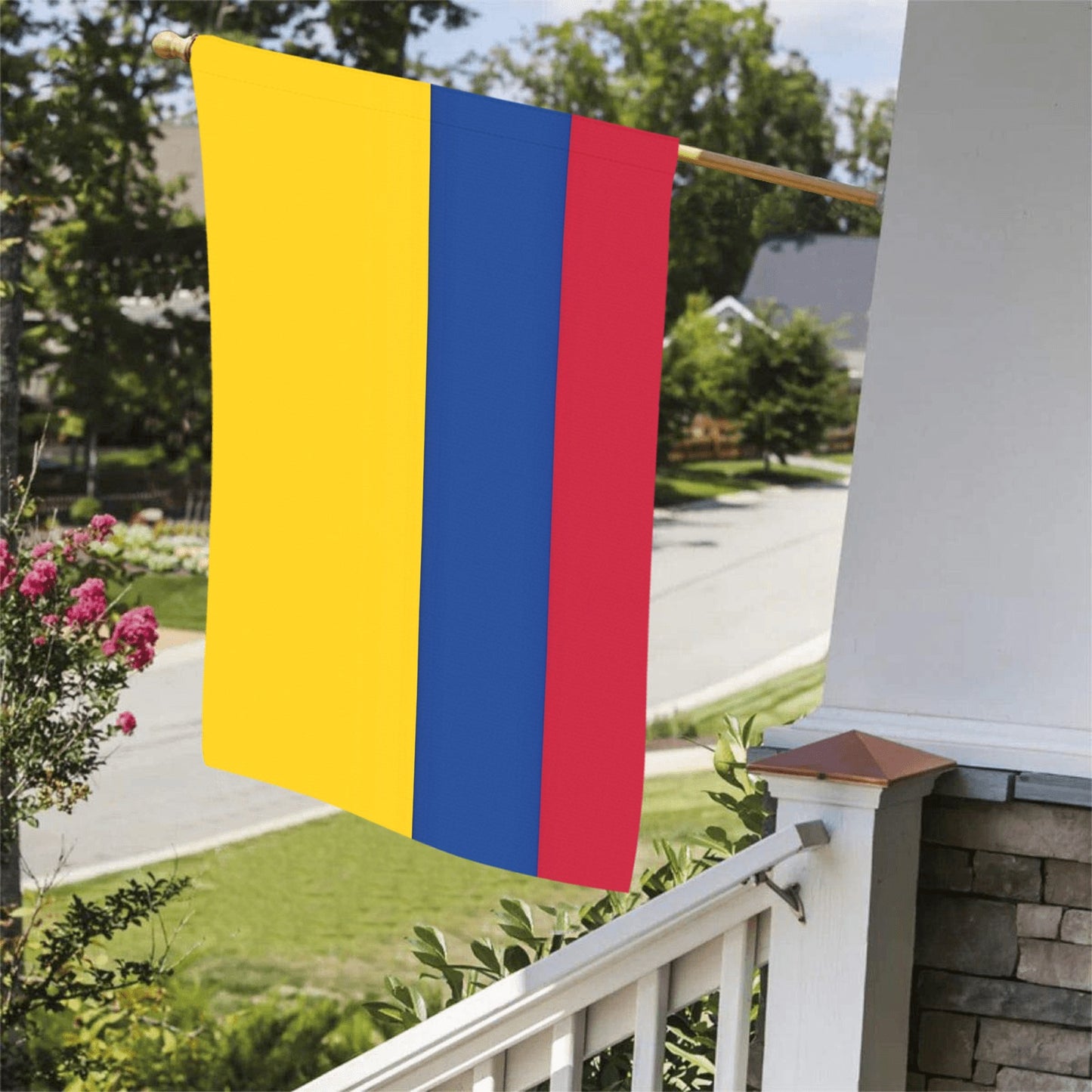 Yellow, blue, red flag hanging outside; Luv My Flag brand.