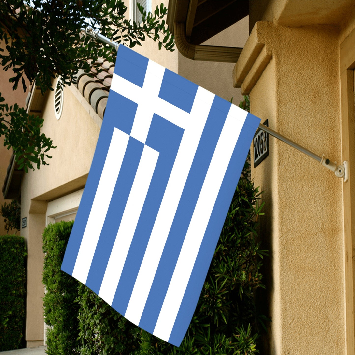 Greek flag displayed outdoors, branded by Luv My Flag.