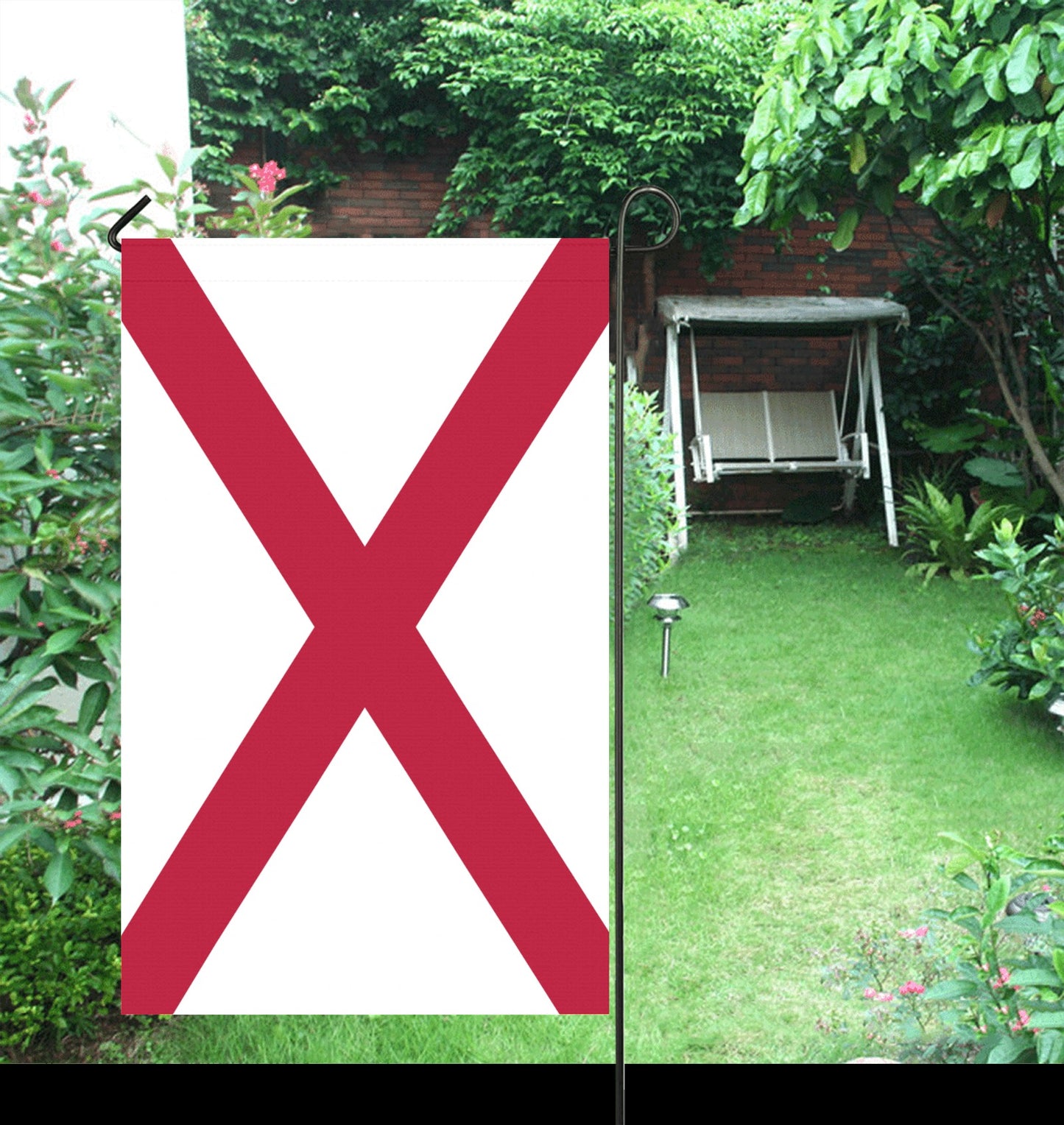 Garden with Luv My Flag featuring a red cross.