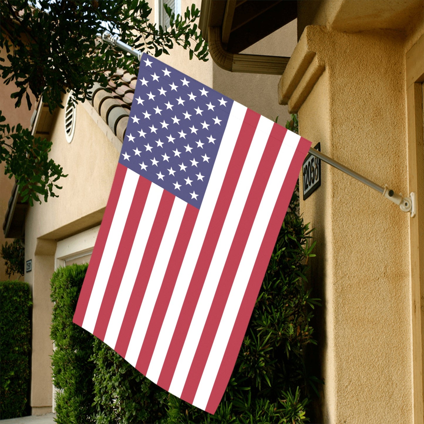 American flag displayed outside a house, by Luv My Flag.