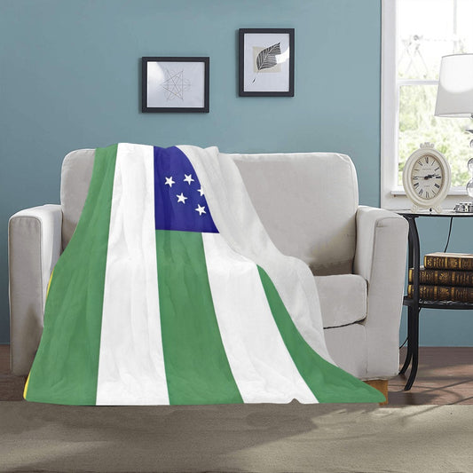 Cozy flag-themed blanket on sofa, Luv My Flag.