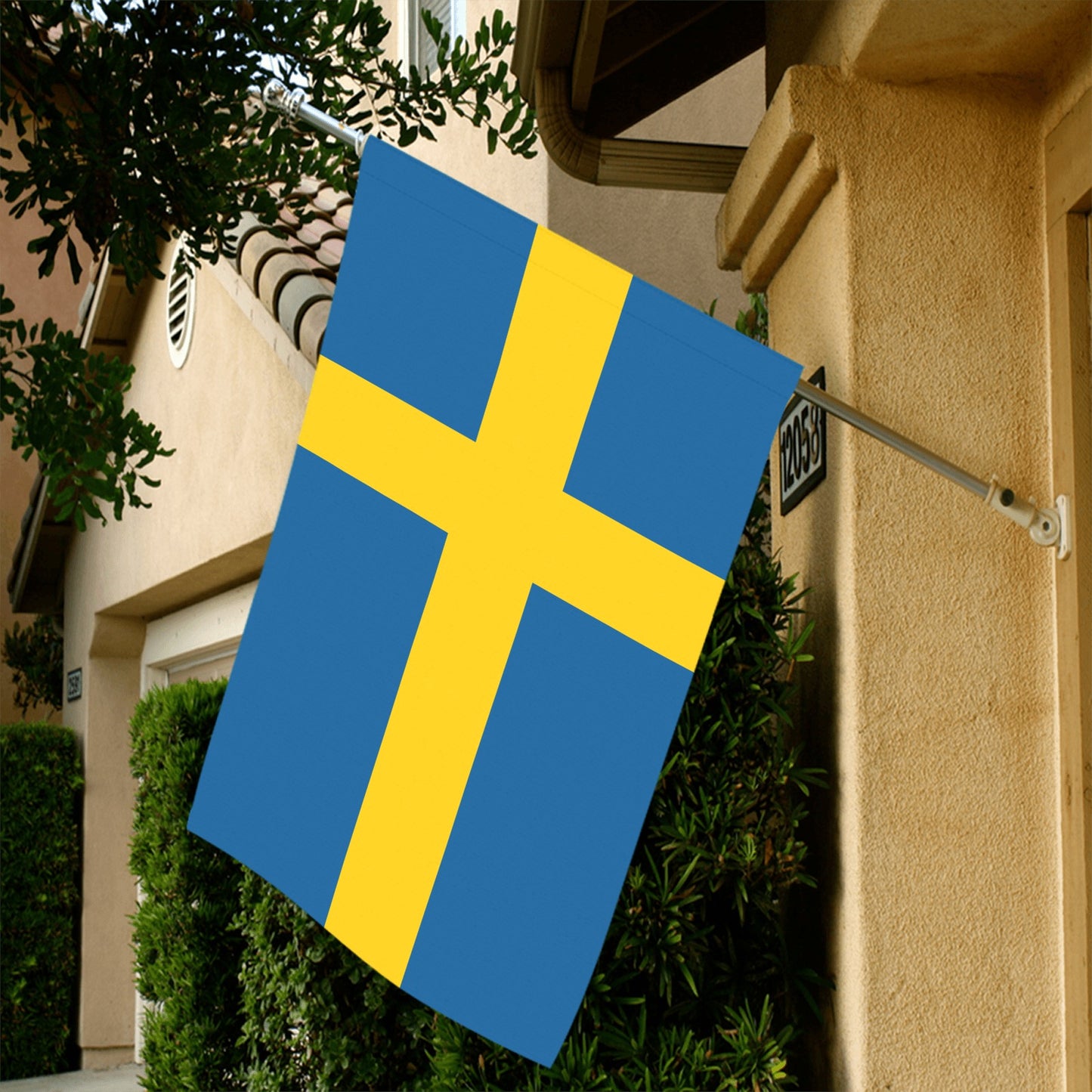 Swedish flag displayed outside home; Luv My Flag brand.