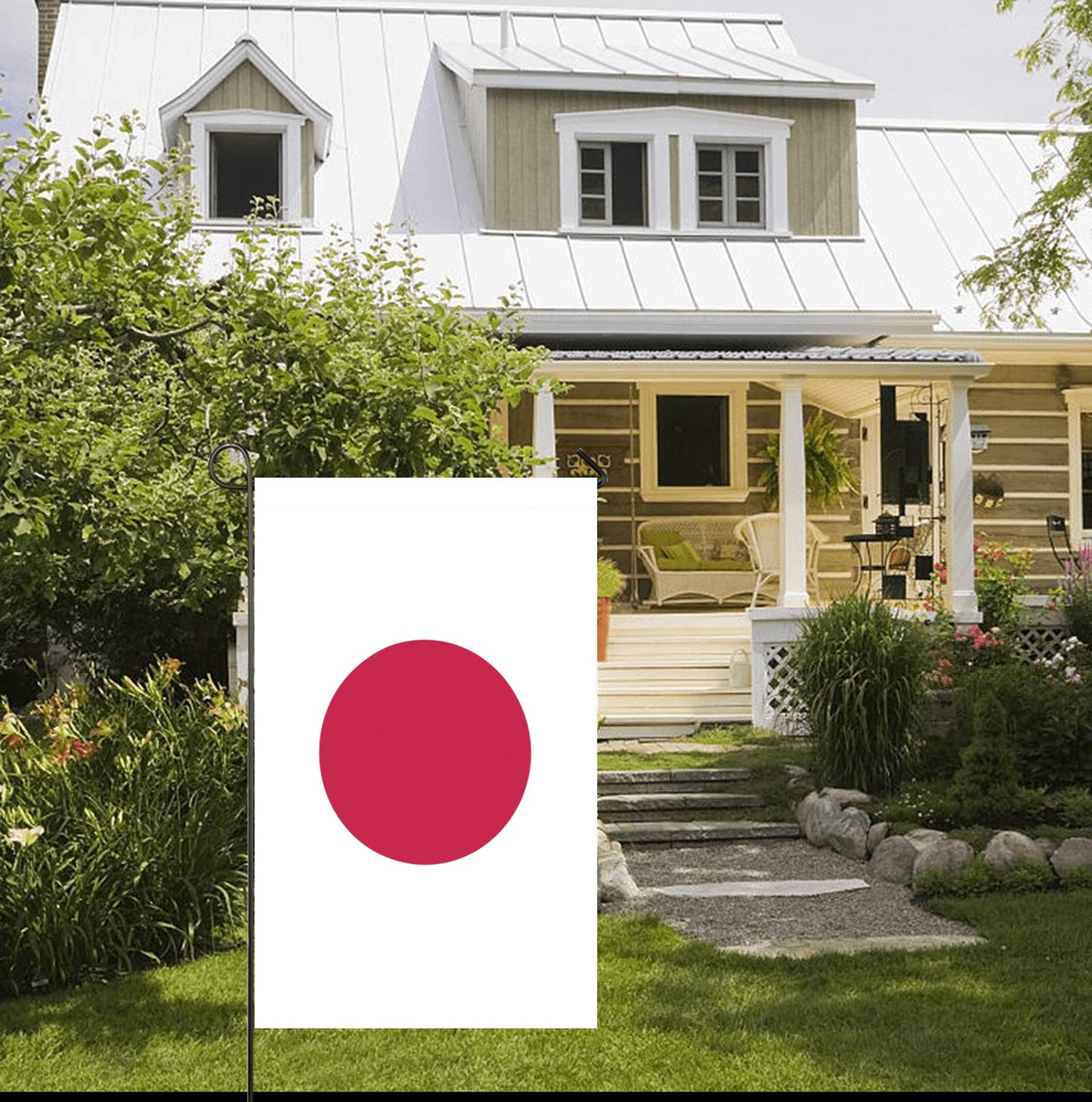 Luv My Flag Japanese flag displayed outside charming country home.