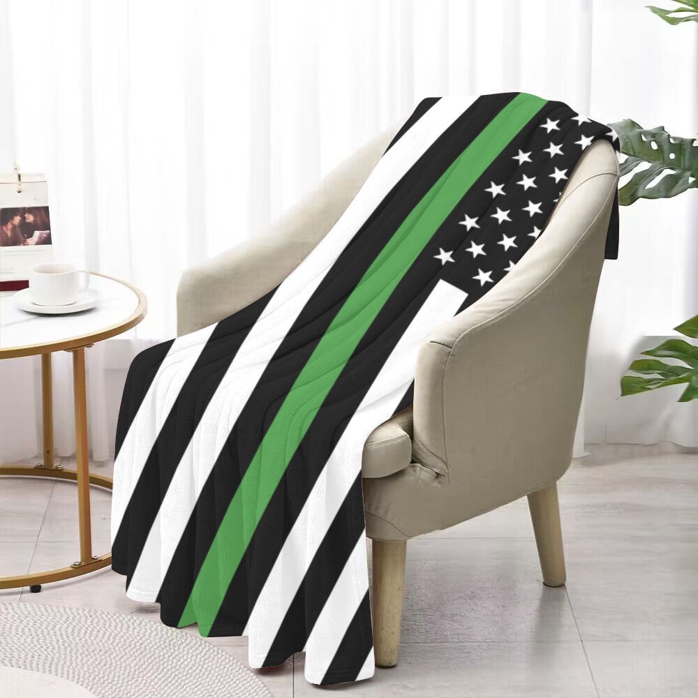 Luv My Flag blanket with stars, stripes, green accents.