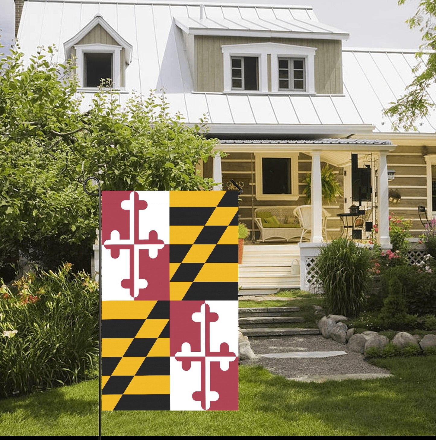Luv My Flag outside charming house with lush green garden.