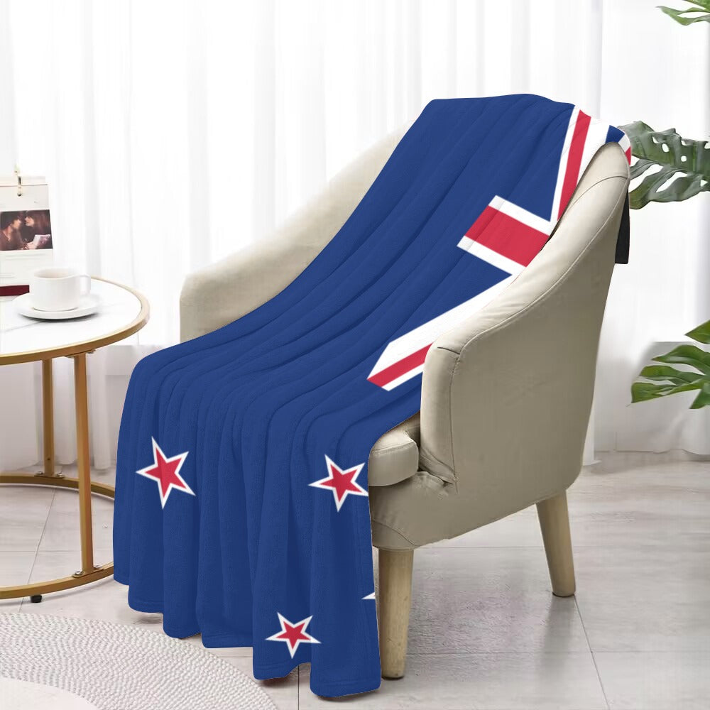 Blue flag-patterned blanket draped over chair, Luv My Flag.