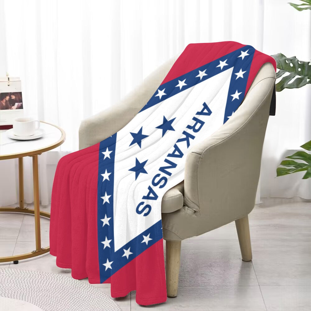 Luv My Flag Arkansas blanket draped over beige armchair.