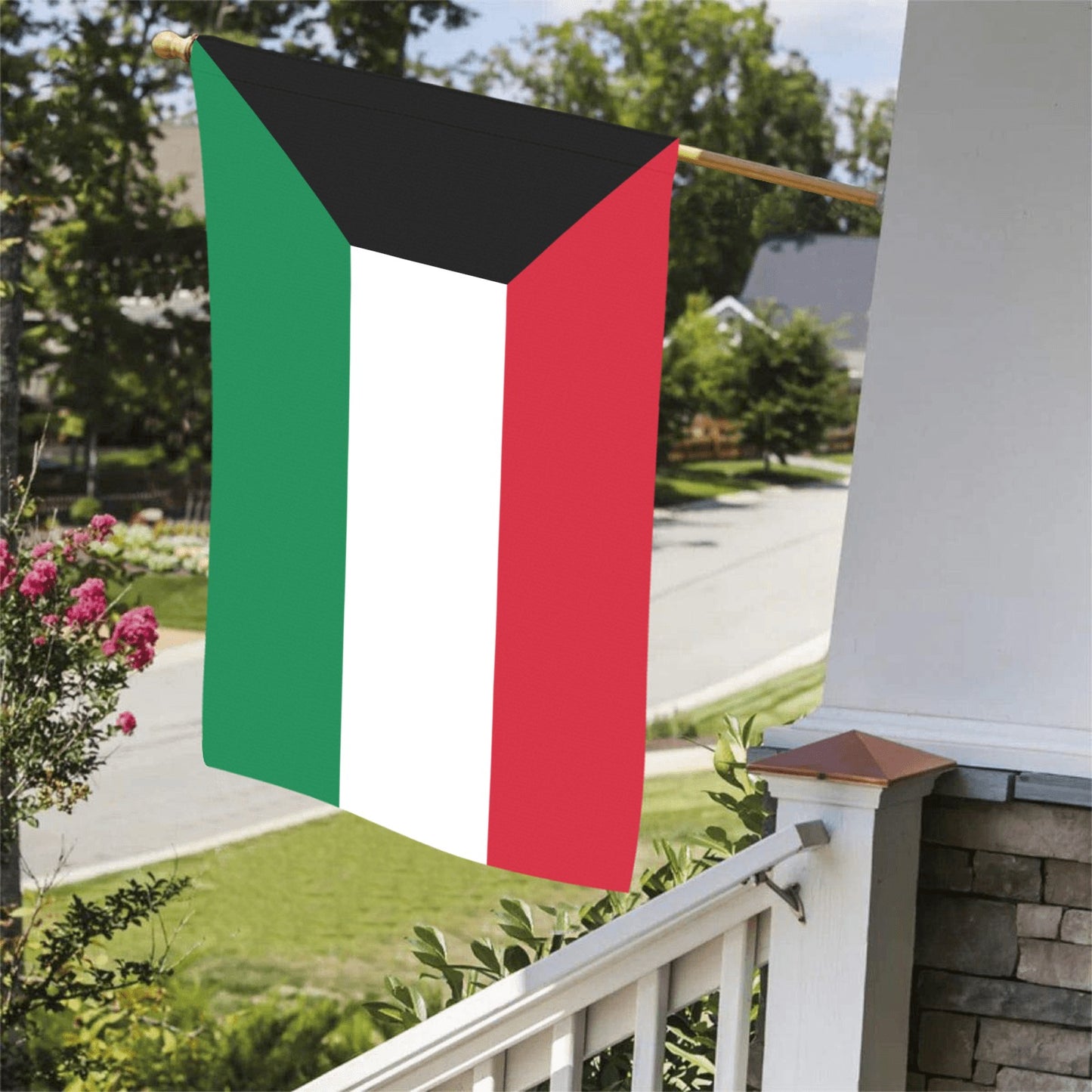 Luv My Flag hung outside, displaying vibrant green, white, red.