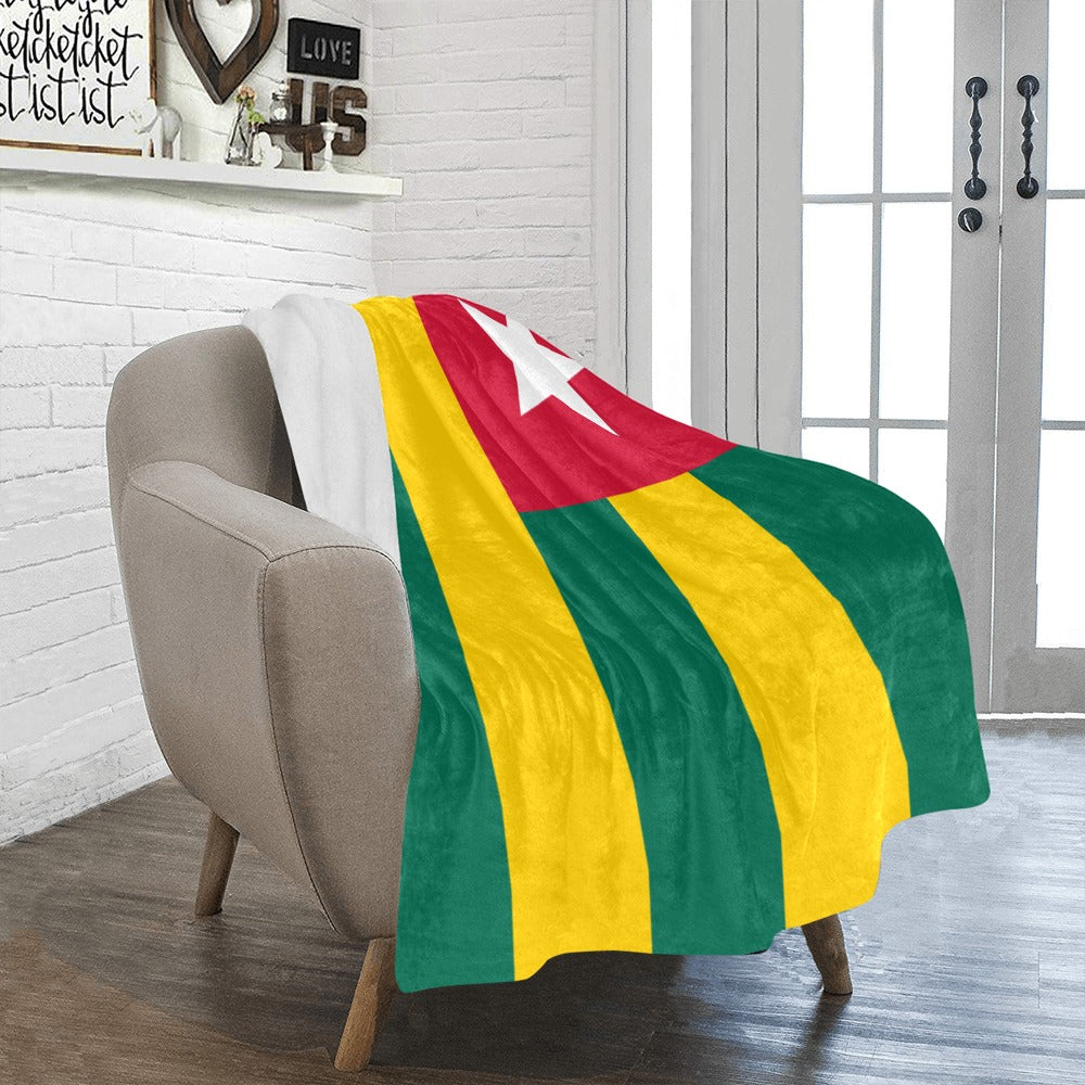 Cozy chair with Luv My Flag Togo flag blanket.
