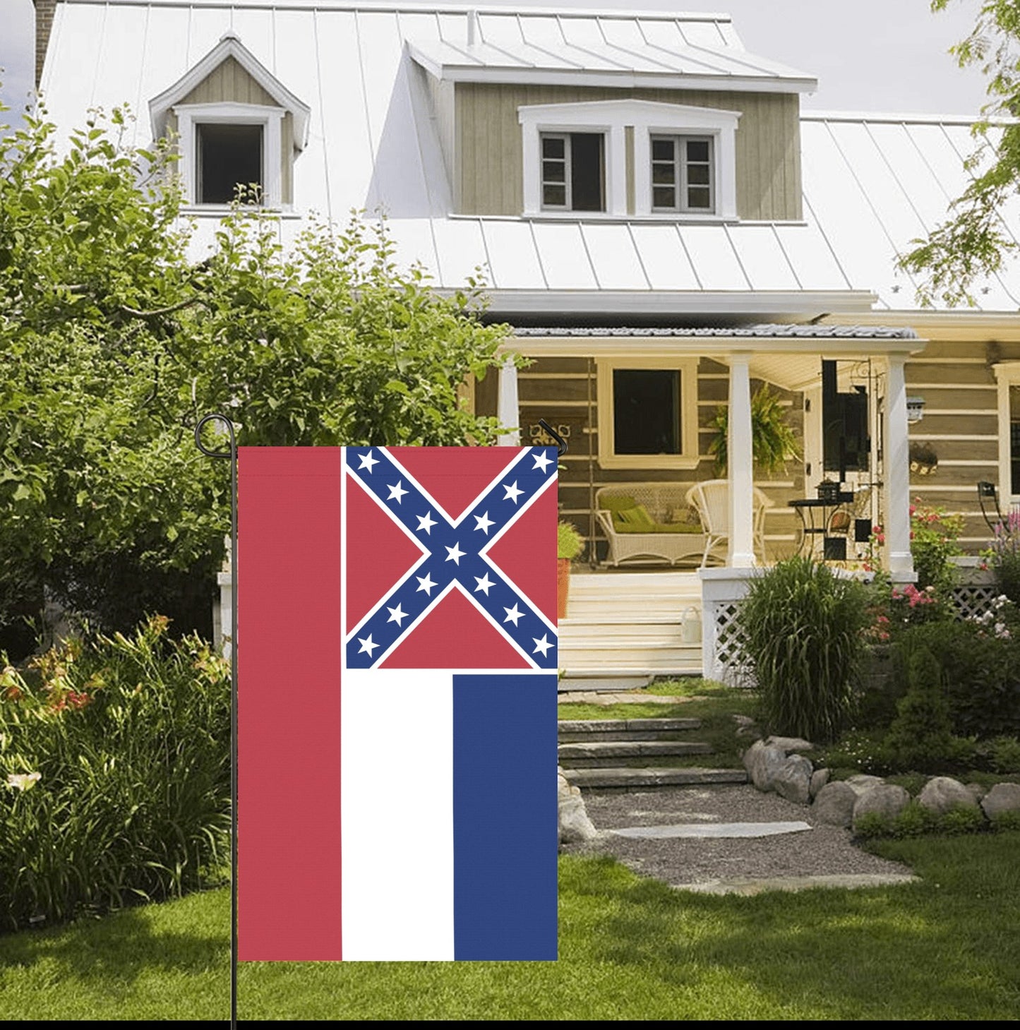 House with Luv My Flag, Confederate design in garden.