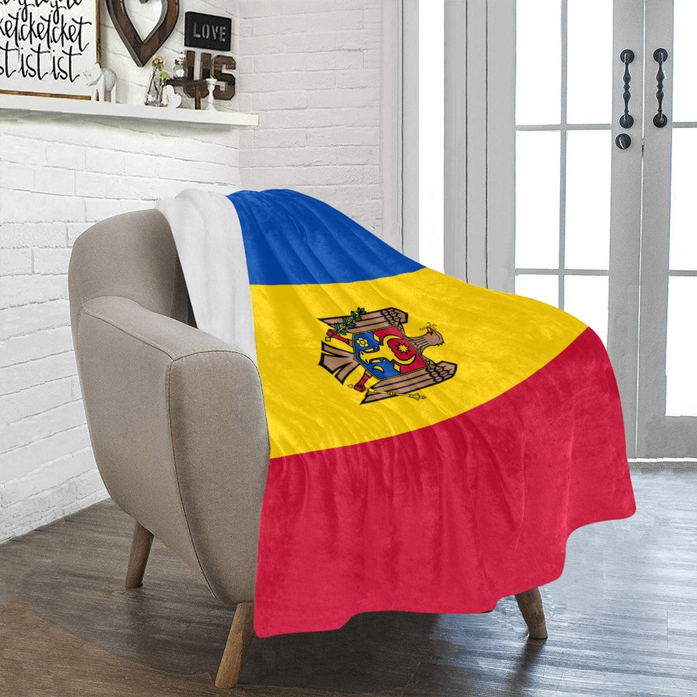 Cozy chair with Luv My Flag Moldovan flag blanket.