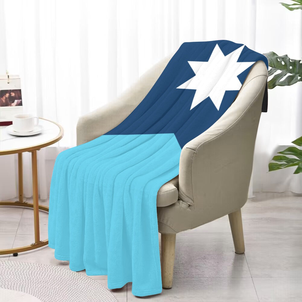 Luv My Flag blue and white blanket on chair.