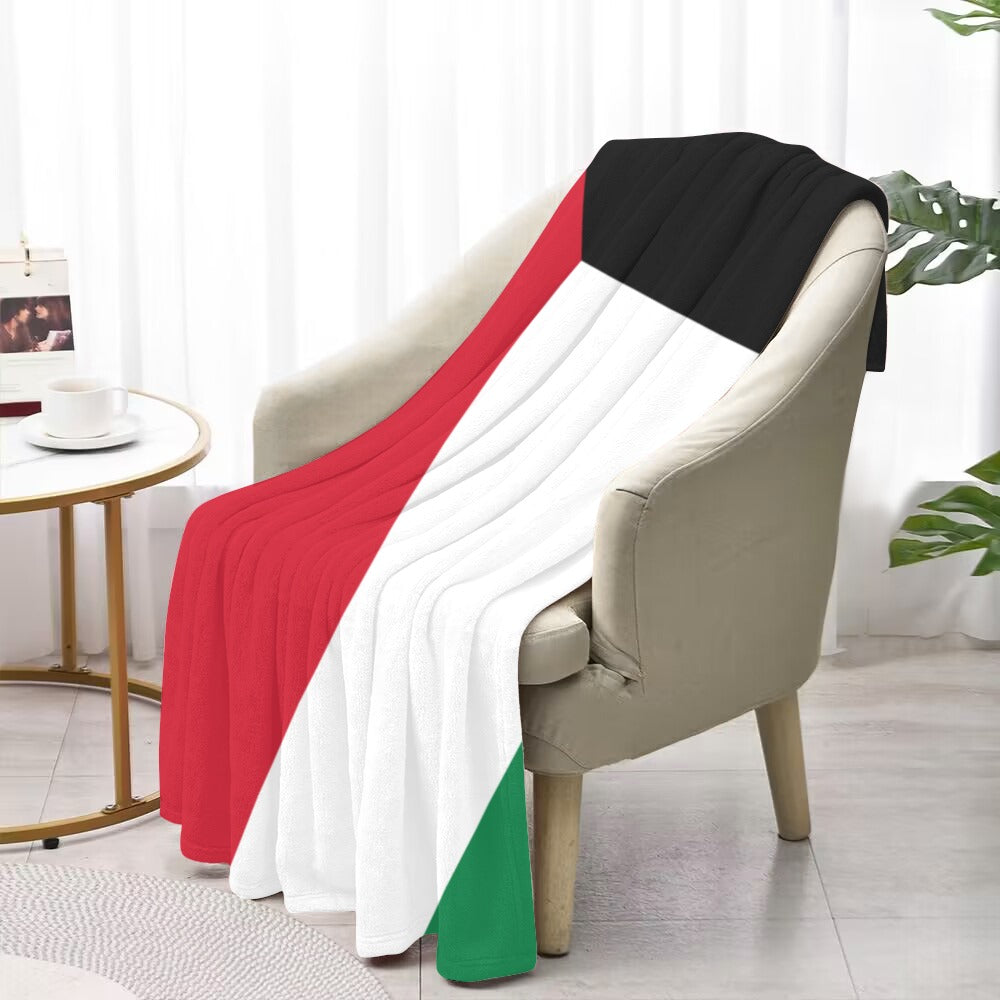 Cozy chair adorned with Luv My Flag themed blanket.