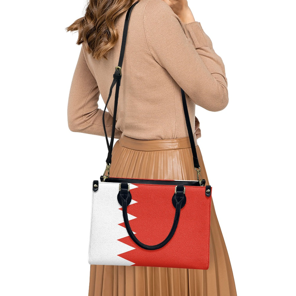 Woman carrying Luv My Flag's Bahrain flag purse.