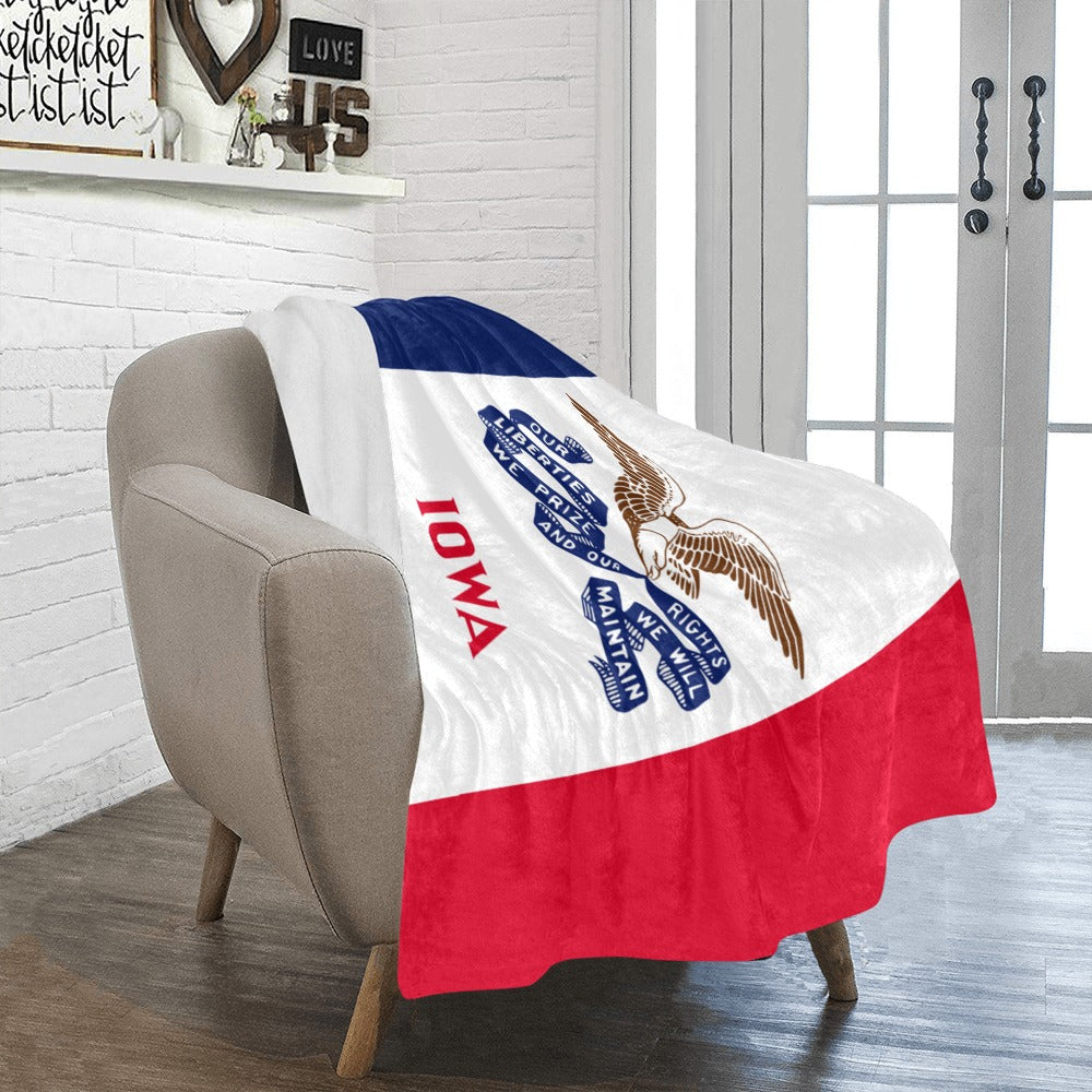 Cozy Luv My Flag Iowa blanket draped over chair.