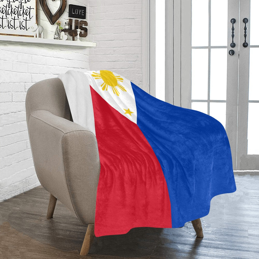 Cozy chair draped with Luv My Flag Philippine blanket.