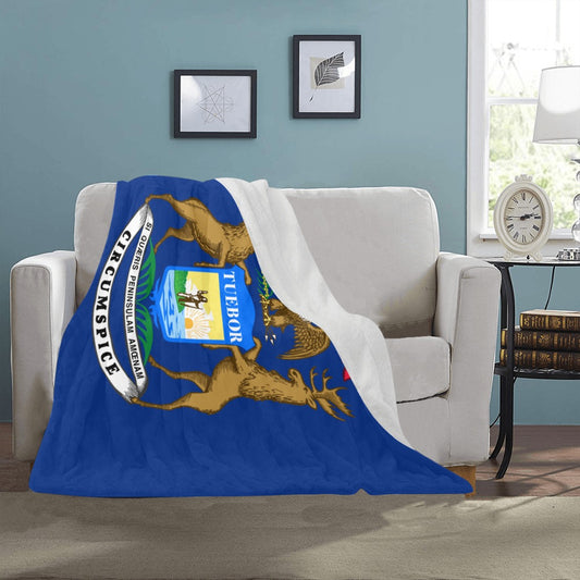 Luv My Flag blanket with Michigan design on sofa.