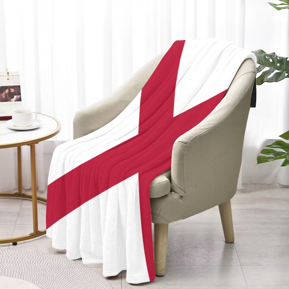 Luv My Flag England-themed throw blanket on armchair. Cozy.