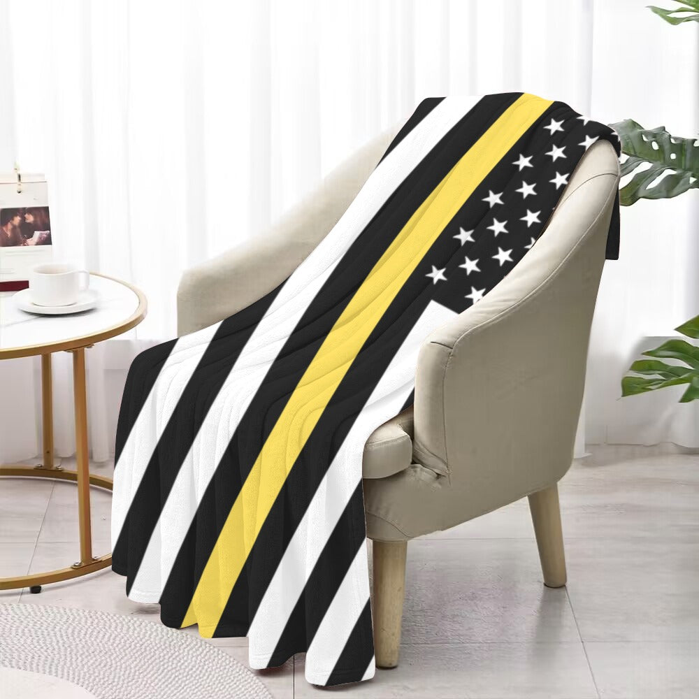 Soft chair draped with Luv My Flag striped blanket.
