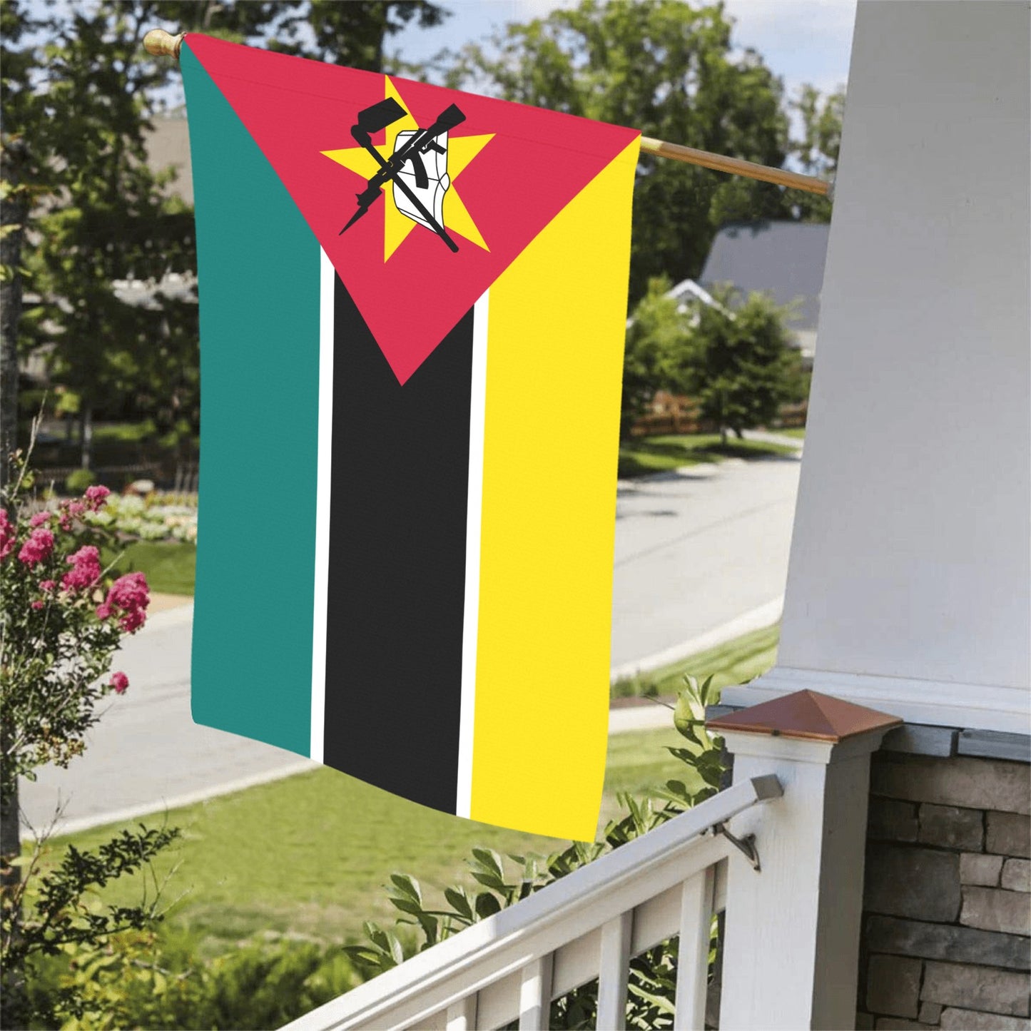 Luv My Flag's Mozambique flag displayed on porch railing.