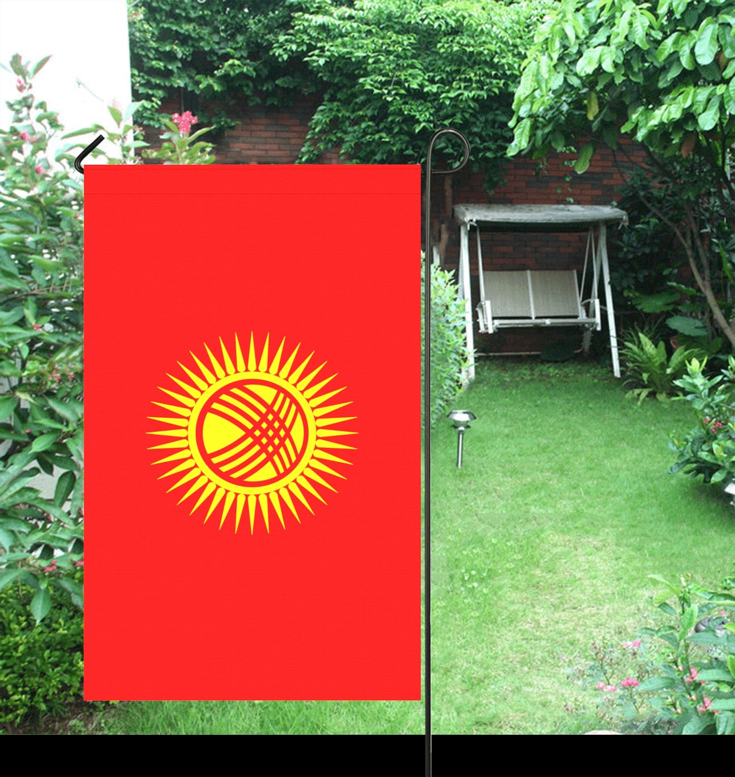 Red garden flag with sun design by Luv My Flag.