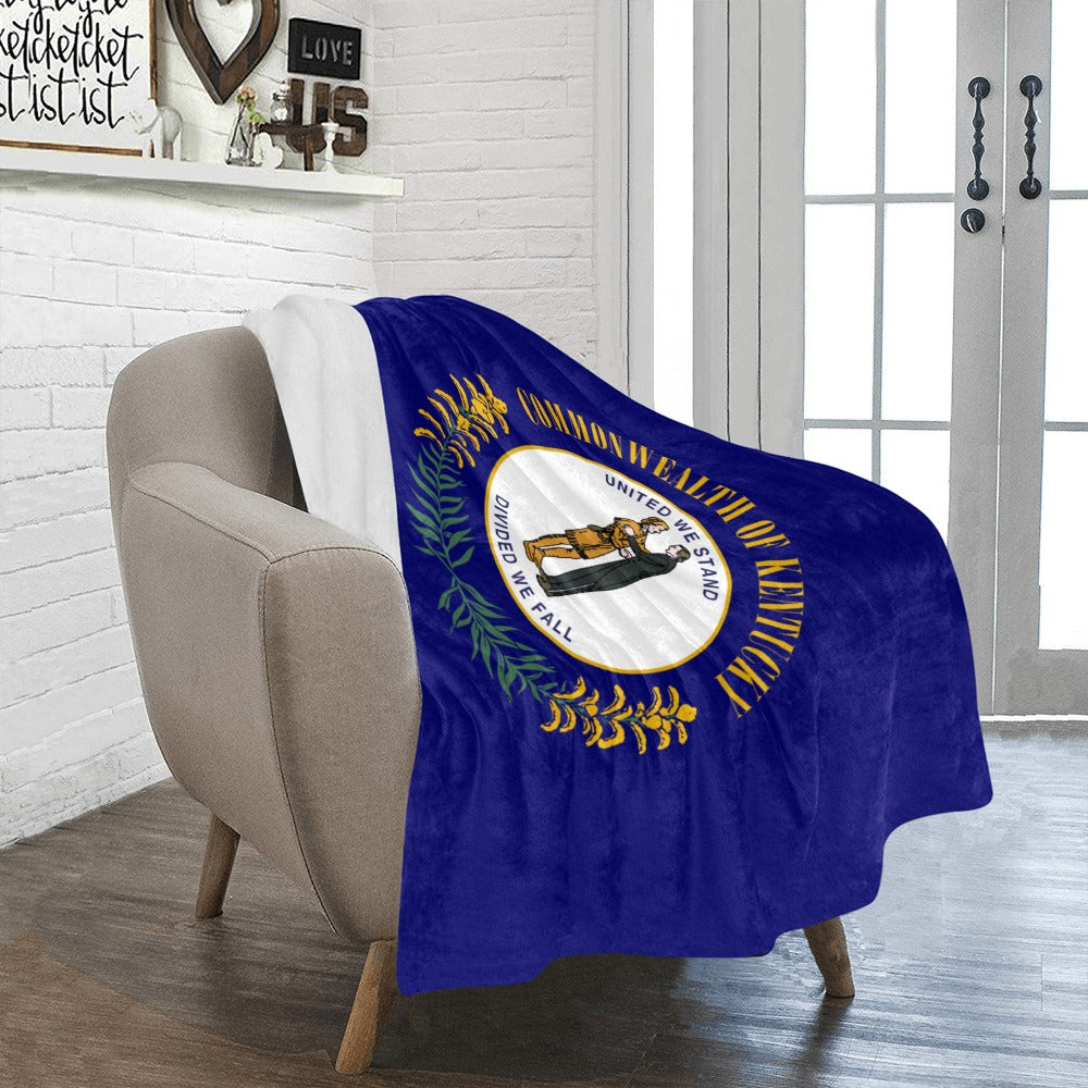 "Luv My Flag Kentucky blanket draped over cozy chair."