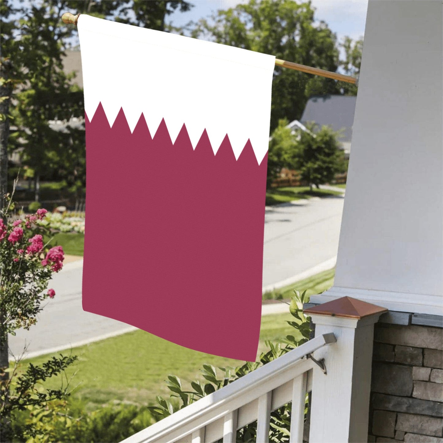 Maroon and white flag by Luv My Flag displayed outside.