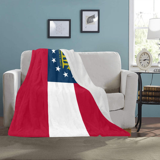 Cozy sofa with Luv My Flag Georgia flag blanket.