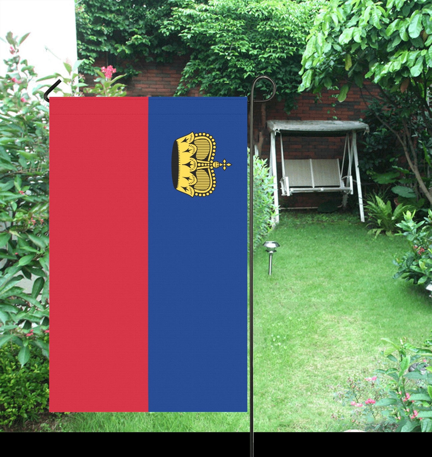 Luv My Flag with crown emblem in garden setting.