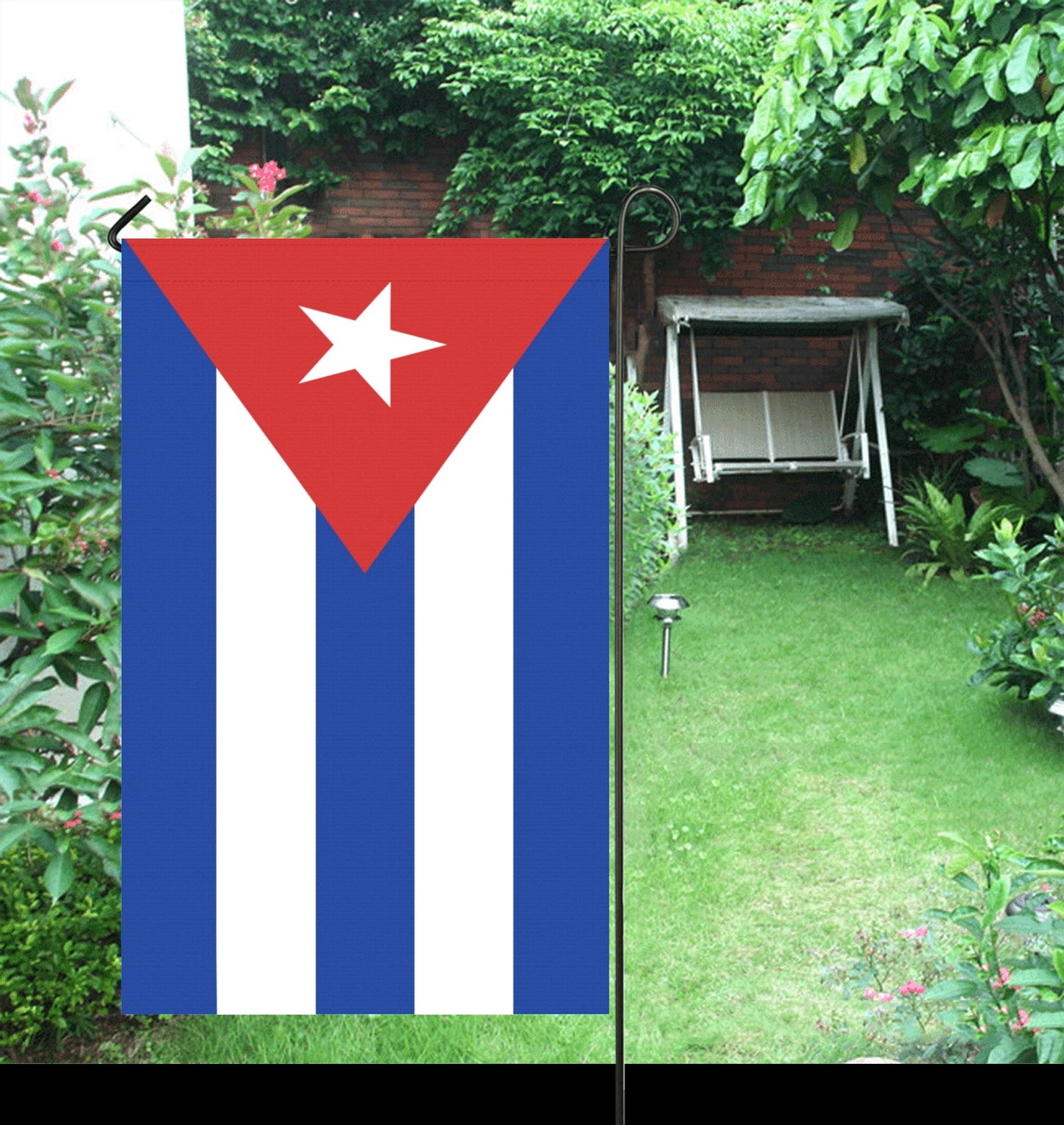 Luv My Flag garden flag with Cuban design in backyard.